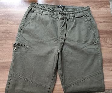 - Məhsul: Kişi şalvarı - Rəng: Xaki/yaşıl - Model: Elastik bel və iplə