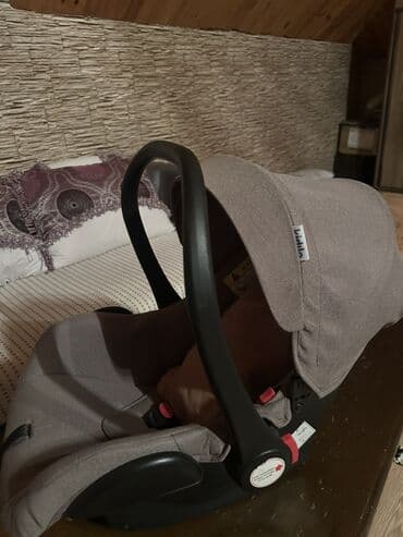 Uşaq avtomobil oturacağı/avtokreslo – daşına bilən kökə tipli model