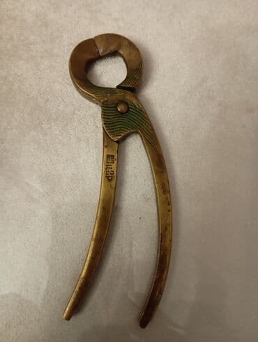 Çörək qabları: Məhsul: Metal qoz-fındıq/qabıq qıran alət - Material: bürünc rəngli — 1