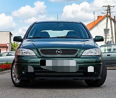 lada vaz 2101: Opel Astra: 1.6 l | 1999 il 400 km Sedan — 1