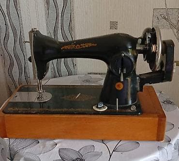 Tikiş maşını – klassik, mexaniki tip - Korpus: metal, qara rəngli