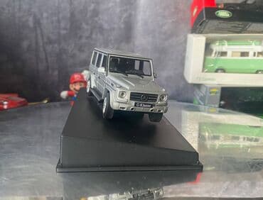 metbex tavan modelleri: Коллекционная модель Mercedes-Benz G-class W463 silver 2012 AutoArt — 12