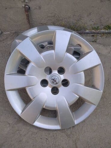 disk kalpaklari: İşlənmiş Kolpak Toyota R 16 — 1
