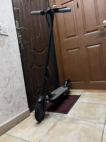 Elektrik skuter - Rəng: qara, yığcam və yüngül konstruksiya - Geniş