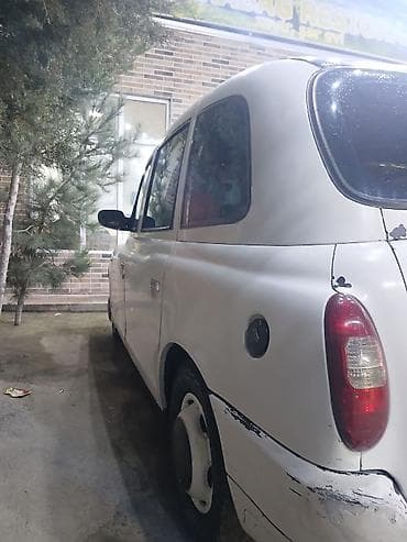 kamazlarin satisi: LTI TX4 London Taxi – klassik taksi dizaynlı, geniş və rahat salonlu — 4