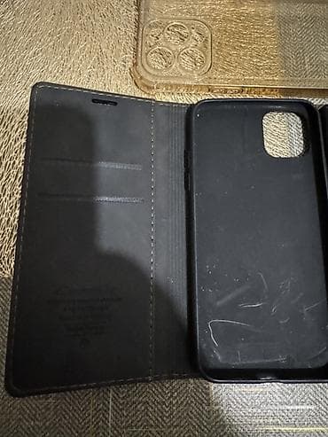 IPhone üçün aksesuar dəsti Məhsul tərkibi: - 2 ədəd qara flip-cüzdan