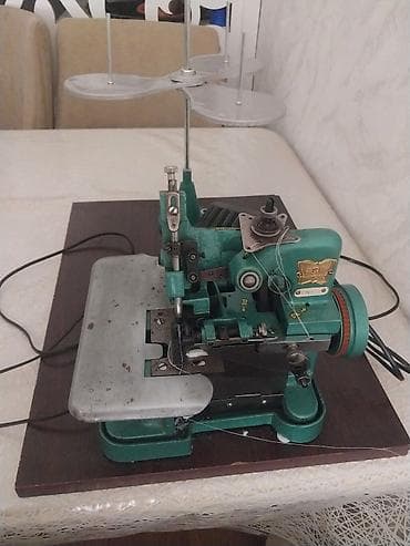 tikiş mawini: Sənaye tipli overlok tikiş maşını - Model: GNF-1D (üstündə istehsalçı — 1