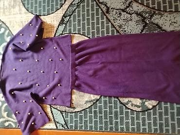 Bənövşəyi rəngdə iki hissəli qadın dəsti: - Üst: qısa kəsimli trikotaj lalafo.az -da Bənövşəyi rəngdə iki hissəli qadın dəsti: - Üst: qısa kəsimli trikotaj