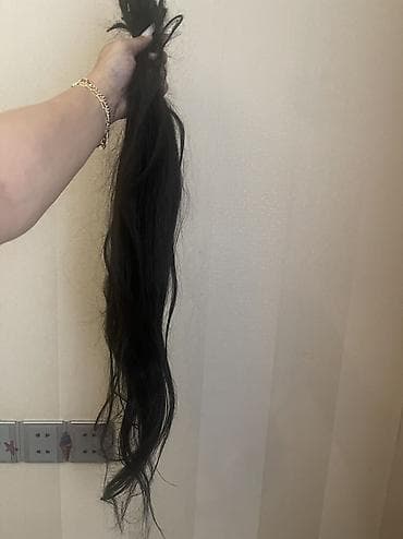 tebii saclarin satisi: Təbii insan saçı – tünd qəhvəyi/qaraya yaxın rəngdə, uzun, dalğalı — 2