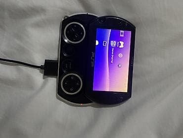 psp 2000: Sony PSP-N1006 (PSP Go) əl konsolu…heç bir problemi yoxdur tam kşdəy — 1