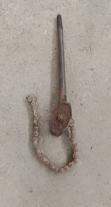 Zəncirli boru açarı (chain wrench) - Mexaniki zəncirli tutacaq