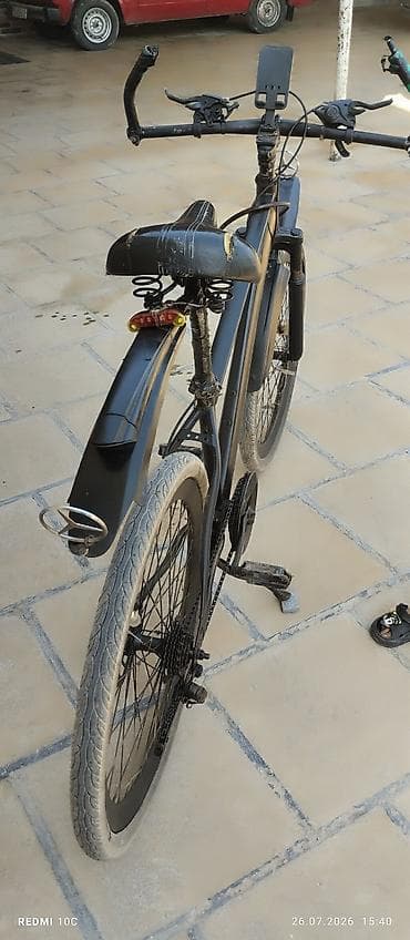 velosibet sekilleri: Şəhər tipli velosiped – qara rəngdə, 26” təkərli Xüsusiyyətlər: - — 5