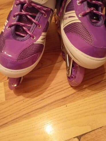 Digər idman və istirahət malları: Bənövşəyi-ağ rəngli inline (təkərli) rolliklər - Marka üzərində — 1