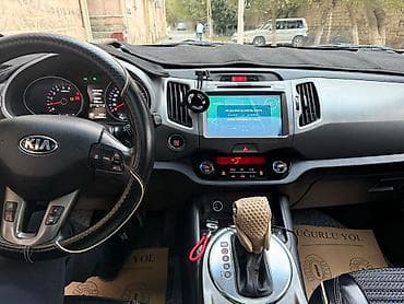 tesla disk: Kia Sportage, ağ rəng, kompakt krossover. Güclü və qənaətcil — 9