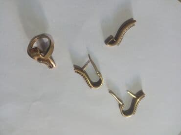 1 qram qizilin qiymeti: Dəstə daxildir: Üzük, Sırğa, Kulon, Gümüş — 5