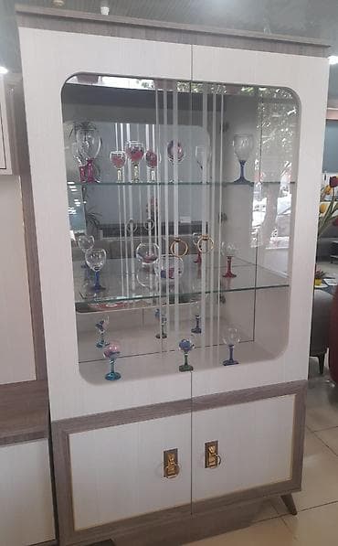 Şüşəli dolab vitrini, İşlənmiş, Ünvandan götürmə