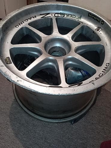 moto teker: Formula 1 həvəskarları üçün F1disqi yarış masin üzərindən çıxıb.OZ — 1