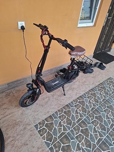 Elektrik nəqliyyatı: Elektrik skuter – oturacaqlı, səbətli model Xüsusiyyətlər: - Güclü ön — 1