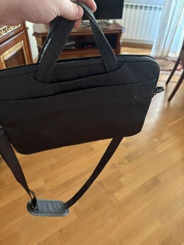 Elektron kitablar: Qara rəngli laptop çantası - Noutbuk üçün nazik və yüngül brifkeis — 1