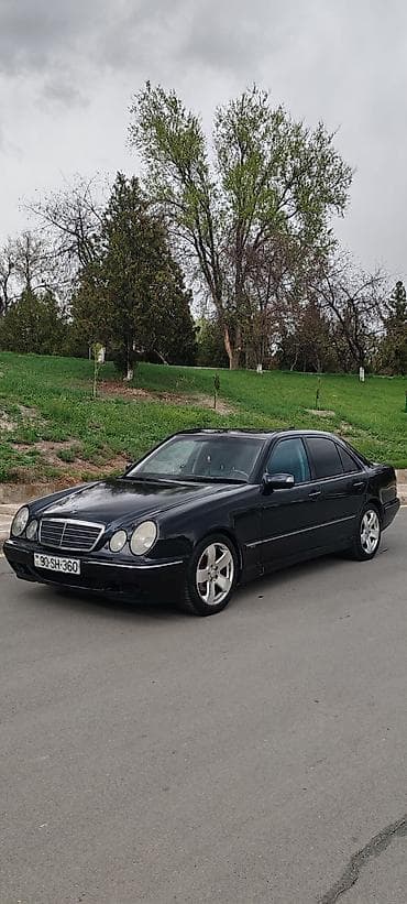 avtomobil aksesuarları mağazası: Mercedes-Benz E 200: 2 l | 2001 il Sedan — 4