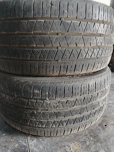 tekerler type 1: Continental markalı avtomobil şinləri. Şinlərin yan hissəsində — 1