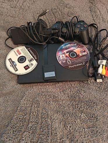 PlayStation 2 Slim (SCPH‑700xx seriyası) Dəst: - PS2 Slim konsolu - 1