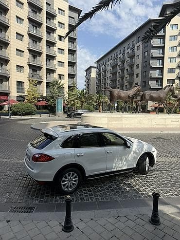 Скупка авто: Porsche Cayenne salonu – bej dəri interyer və yüksək komfort paketləri — 10