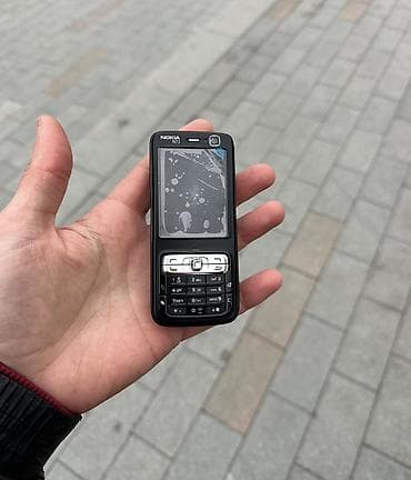 ucuz ev telefonu: Nokia N73, rəng - Qara, Düyməli — 1