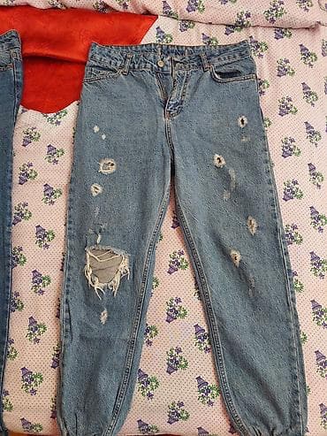 duyməli: Mavi rəngli cins şalvar – dizaynı yırtıqlı/distressed model. - Klassik — 1