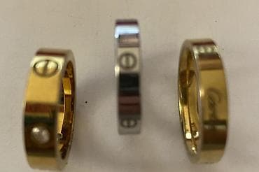 cartier üzüklər: Cartier üslubunda üzük dəsti - Dəstdə 3 ədəd üzük var: 2 ədəd qızılı — 1
