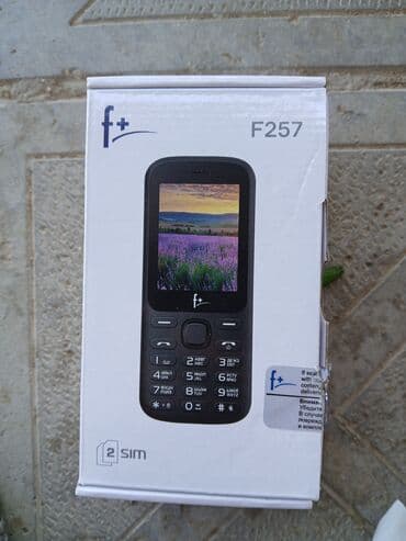 телефон fly ds105c: F+ brendinin F257 modeli mobil telefonu. Bu cihaz qara rəngdədir və — 1