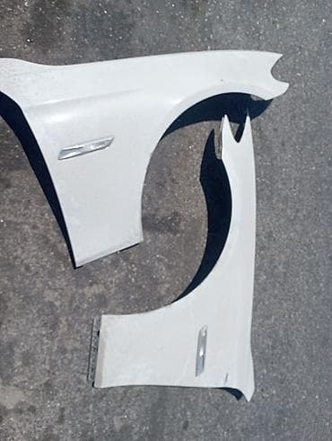 kuzu: Məhsul: Avtomobil üçün ön qanad cütü - Rəng: Ağ - Material: Metal - — 1