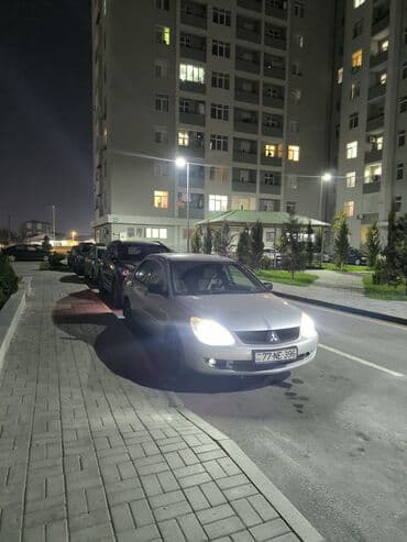 e 124: Mitsubishi Lancer: 1.6 l | 2006 il 34000 km Sedan — 2