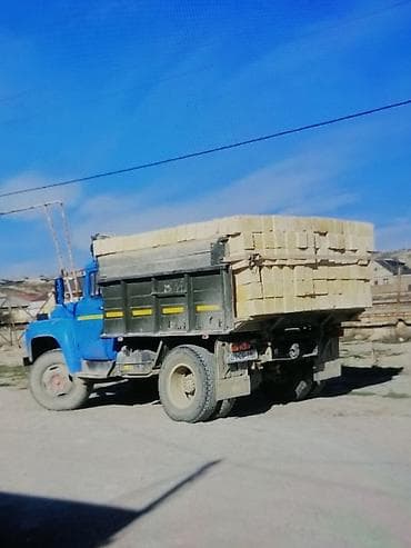 yuk taksisi: Qumdaşı - Tikinti üçün kəsmə ağ daşların yük maşınları ilə daşınması — 2