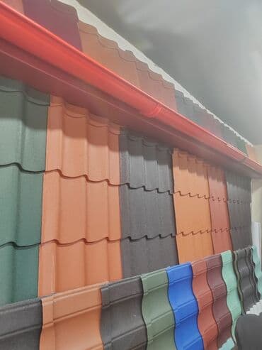 yağmur su cənləri: Bina damlarından suyun kənara axıdılması üçün nəzərdə tutulmuş metal — 9