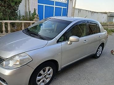 Nissan Tiida: 1.6 l | 2007 il Sedan — 4