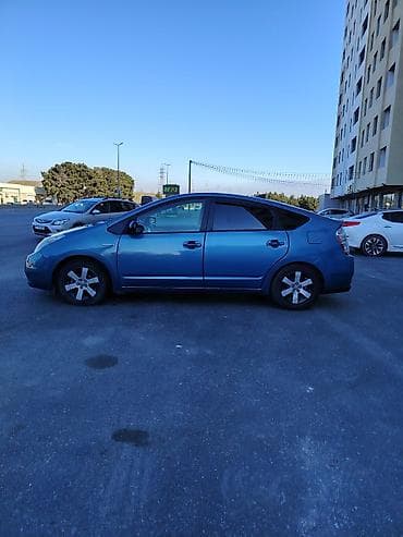 ford ehtiyat hisseleri: Toyota Prius (2-ci nəsil) hibrid hetçbek - Rəng: mavi - Salon: boz — 8