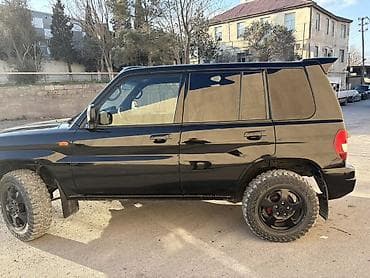 04 maşınlar: Mitsubishi Pajero: 1.8 l | 2000 il 394000 km Ofrouder/SUV — 8