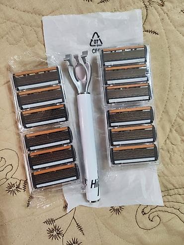 bas: Kişi ülgücü dəsti Məhsul tərkibi: - 1 ədəd metal başlı, tutacağı ağ — 3