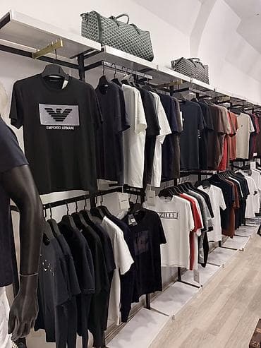Полочные витрины: Mağaza üçün divar tipli geyim rəfi sistemi - Material: toz boya — 1