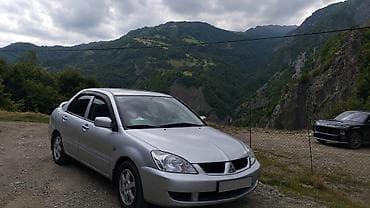 qosqu satisi: Mitsubishi Lancer: 1.6 l | 2007 il 280 km Sedan — 1