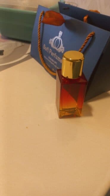 дивайн духи цена ош: Sofi Perfume tərəfindən təklif olunan bu ətir, qızılı rəngli qapağı və — 1