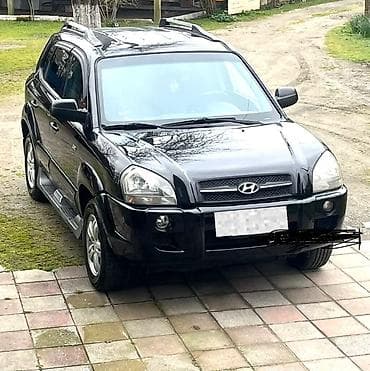 bmw e39: Hyundai Tucson: 2 l | 2007 il — 7