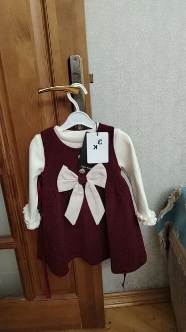 Uşaq paltarı dəsti heç geyinilməyib uşağa balaca olduğu üçün.2,3,4