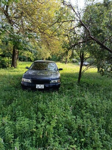 qadınlar ucun maşınlar: Nissan Maxima: 3 l | 1998 il Sedan — 4
