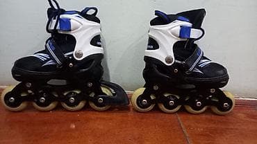 Qaçış trenajorları: İnline təkərli konki (rollerblades) - Rəng: qara-ağ, mavi detallarla — 2