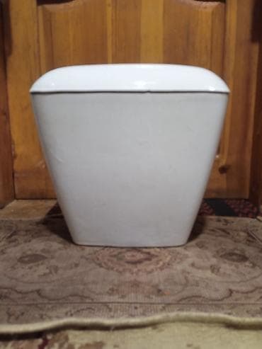 бачок для унитаза: Məhsul: Keramika tualet bakı (üst qapaqlı) Xüsusiyyətlər: - Material — 1