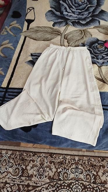 Geniş kəsimli, açıq krem rəngdə yay şalvarı. - Model: Palazzo/şalvar