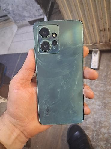 ucuz modemler: Redmi not 12 modeli idial vəzyetdə star baks temali kablosu usdundə — 5