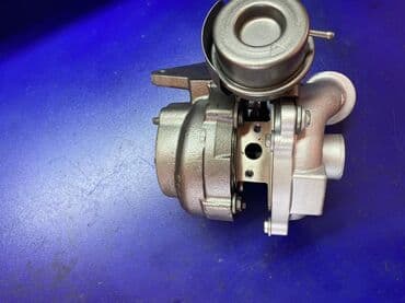 sak mator: Gümüşü rəngdə olan bu turboçarx, mühərrikin gücünü artırmaq üçün — 2